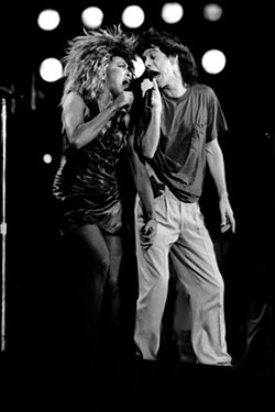 Mick Jagger and Tina Turner perform at Live Aid in Philadelphia. - PHOTO ©GETTY IMAGES/COURTESY GROVE ATLANTIC