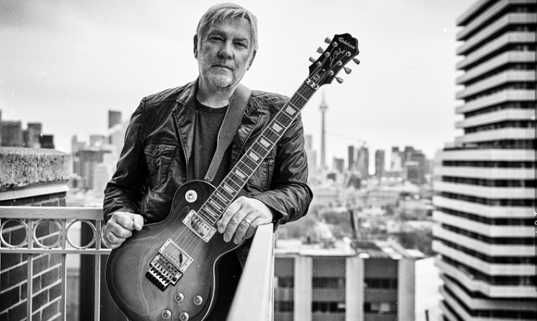 Alex Lifeson with his signature Epiphone Les Paul.  - PHOTO BY RICHARD SIBBALD