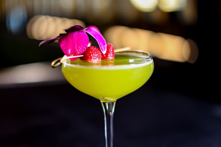 Pushing Daisies is a colorful  and fruity cocktail. - PHOTO BY RAYDON CREATIVE