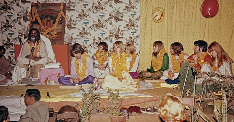The Maharishi Mahesh Yogi lectures with the Beatles and their significant others listening.  - SCREEN GRAB