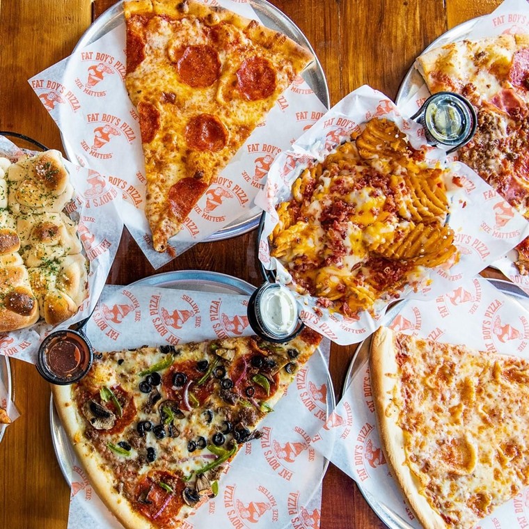 Big slices make pizza lovers happy. - PHOTO BY FAT BOY'S PIZZA