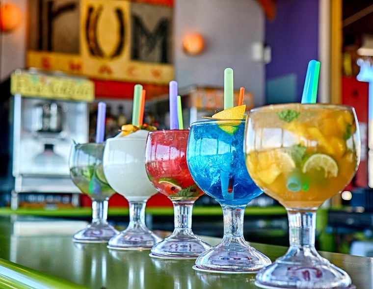 A rainbow of rum drinks at RumShack. - PHOTO BY THE SPOT