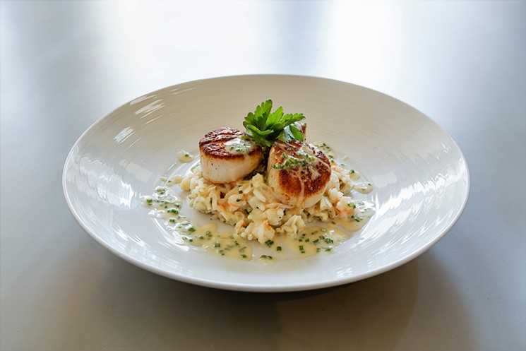 The seared scallops on the Field & Tides menu looks scrumptious. The new restaurant debuted on February 13. - PHOTO COURTESY OF FIELD & TIDES