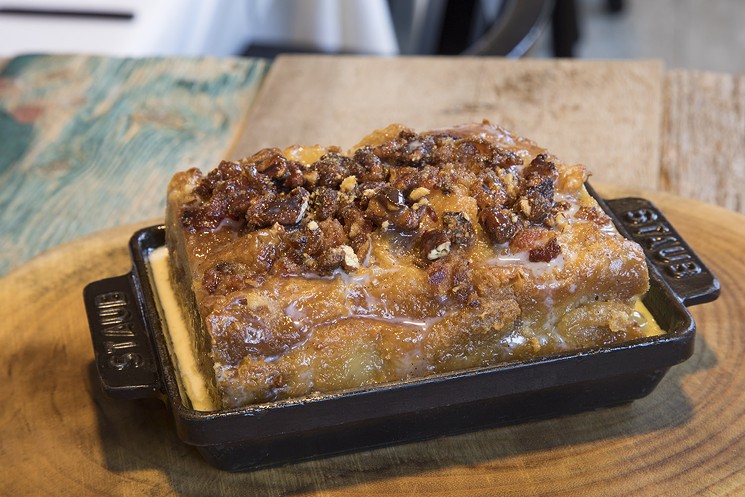 The maple bacon croissant tres leches bread pudding was pillowy and soft inside; brown and crisp on the outside. - PHOTO BY TROY FIELDS