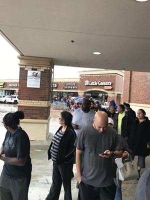 The line at Kroger on Barker Cypress and FM 529 on Tuesday morning. - PHOTO BY KAT PHELPS