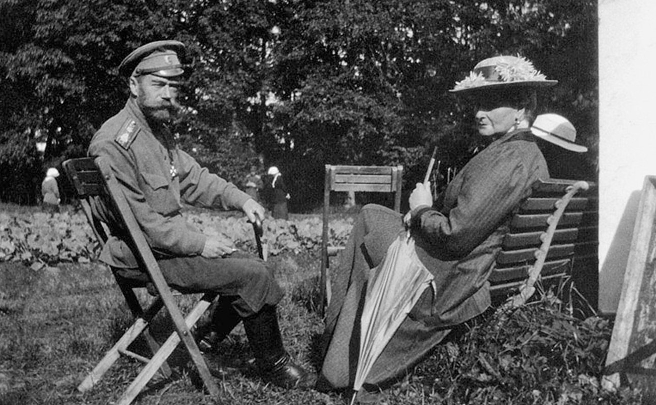 The former Tsar Nicholas II after his abdication, now under house arrest, with Alexandra in the Alexander Park at Tsarkoe Selo, Spring 1917.