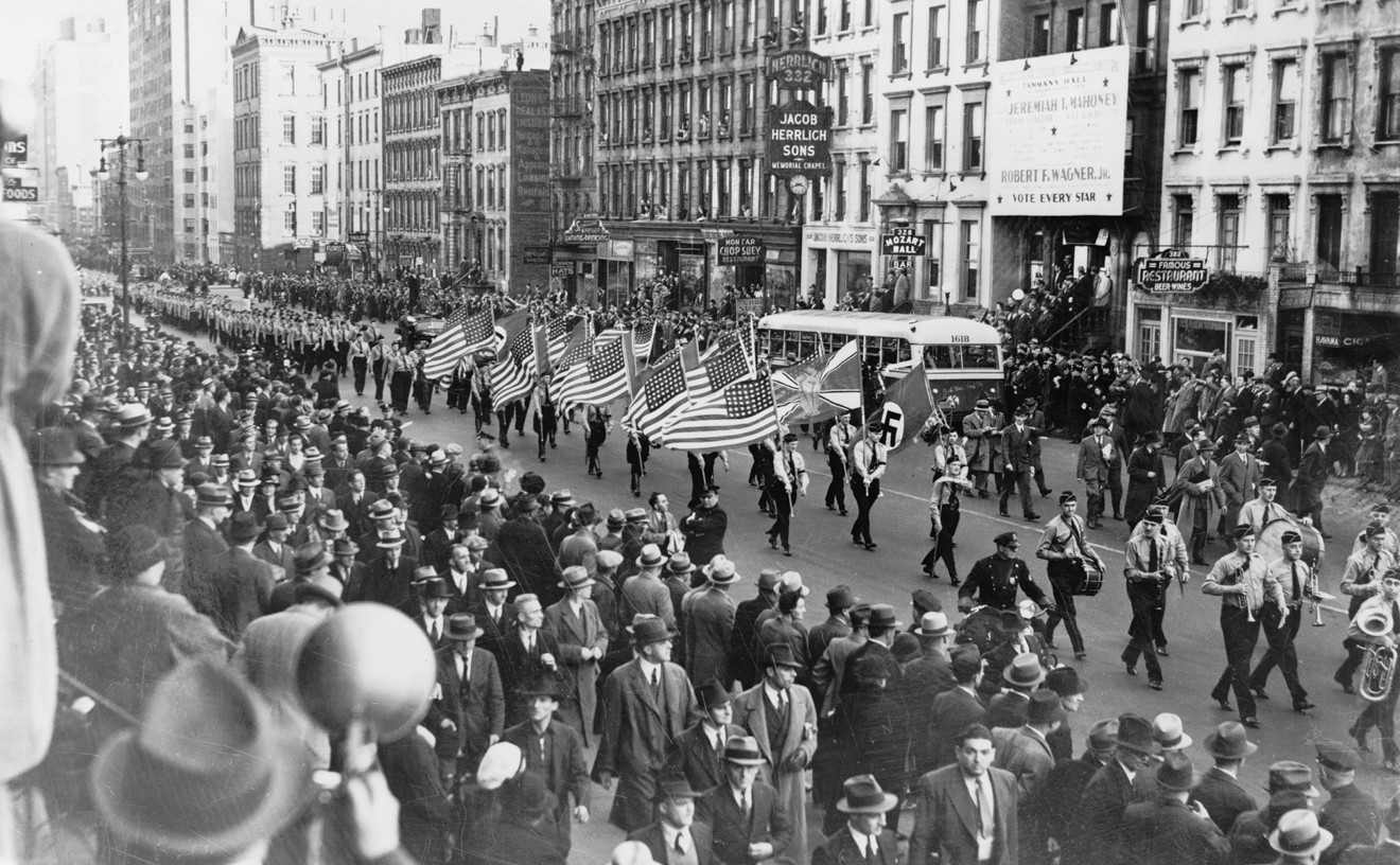 The German American Bund held parades in which U.S. and Nazi flags were marched side  by side, like in this one from October 30, 1939 on the streets of New York City.
