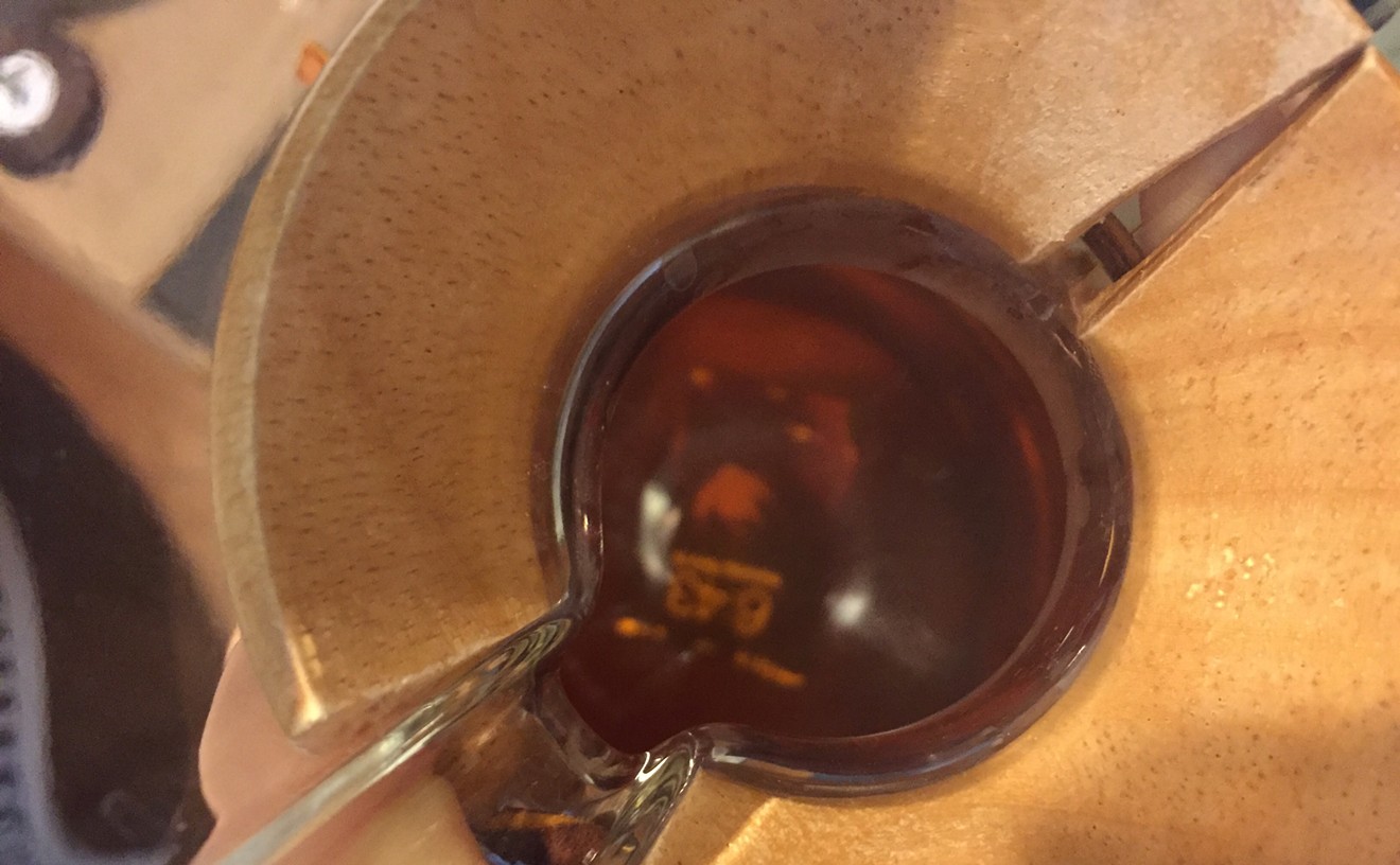 Consommé so clear you can see the markings on a Chemex at the bottom of a quart or so ...