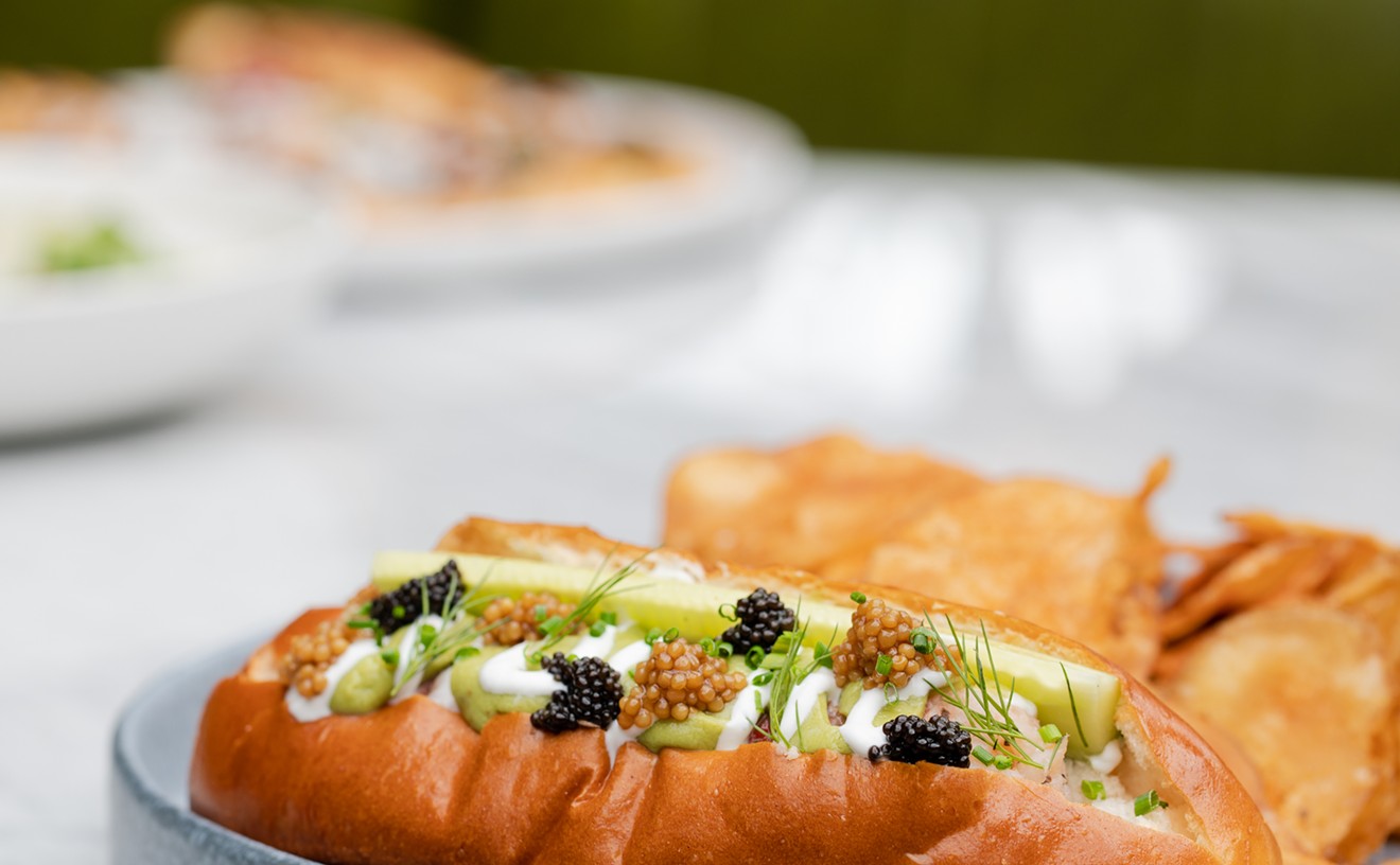 Get a taste of the Not Dog, chef EJ Miller’s spin on the classic Lobster Roll that’s finished with avocado mousse, pickled mustard seed and caviar and is available at The Sporting Club.