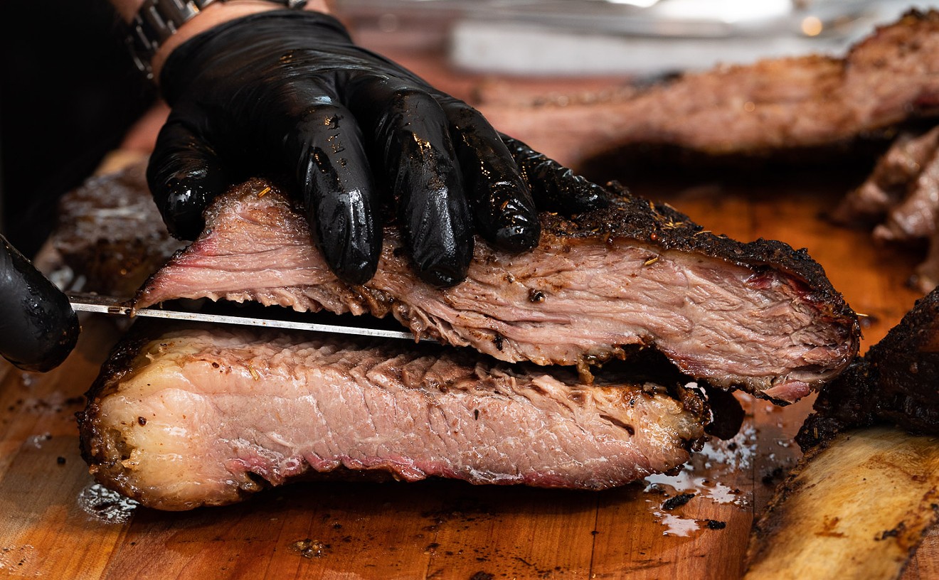 Chef Tim Love has debuted his 28-day dry-aged brisket at Woodshed Smokehouse.