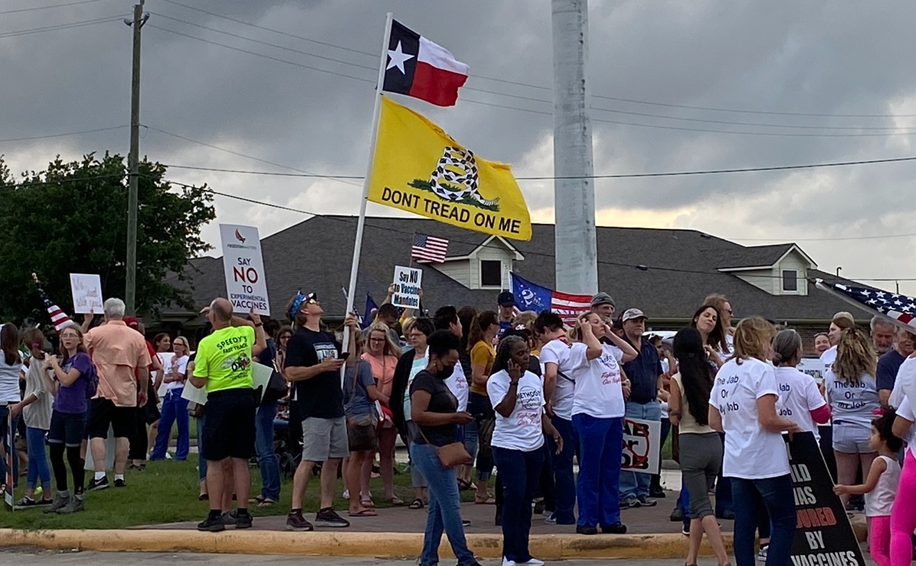 Unvaccinated Houston Methodist employees and their supporters protested the hospital's vaccine mandate Monday night.