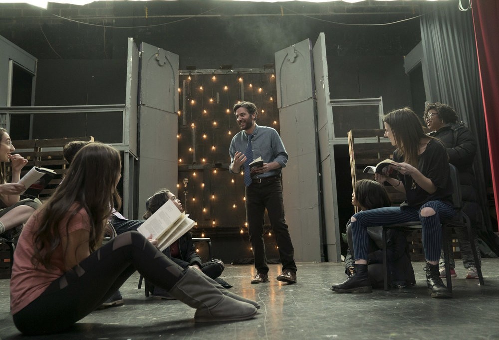 Josh Radnor (middle) plays Lou Mazzuchelli, an English teacher who takes the reins of Stanton High School’s theater program, in Rise, NBC's hourlong drama that doesn't always hit the high notes.
