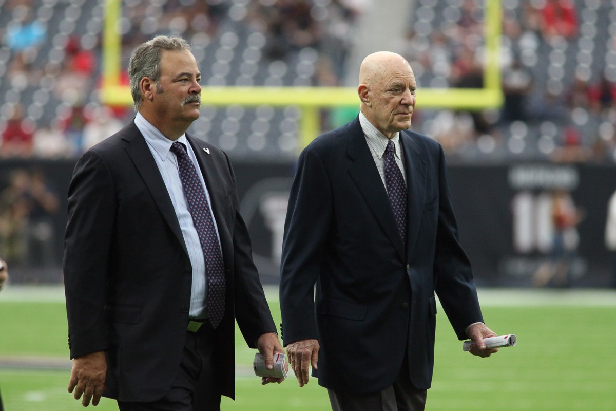 Cal McNair, left, took over after his father, Bob McNair (right), passed away. Still, things remain stagnant.