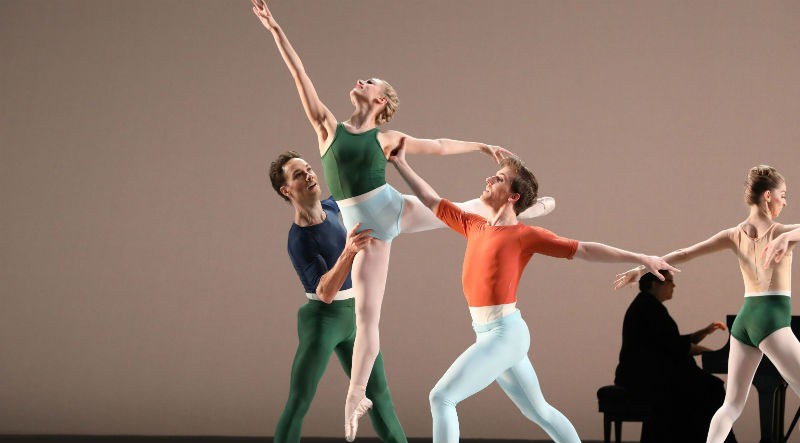 Soloist Tyler Donatelli (center) with soloist Bridget Kuhns and artists of the Houston Bellet in Justin Peck's Reflections.
