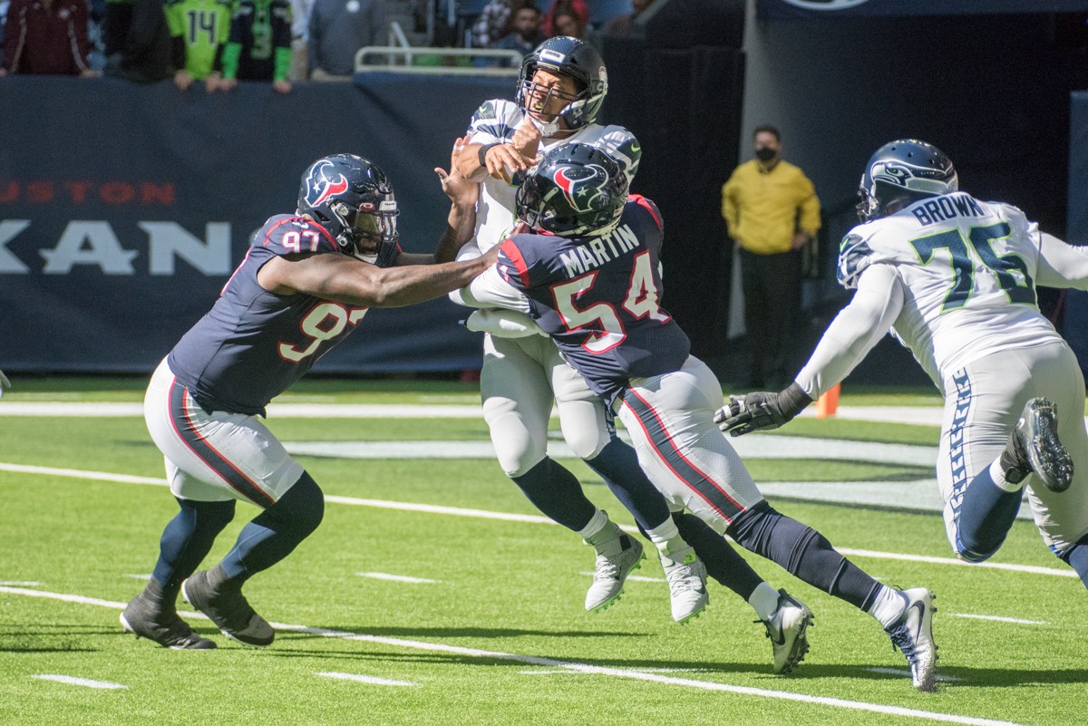 Maliek Collins (97) and Jacob Martin (54) are among the many Texans with positive COVID tests recently.