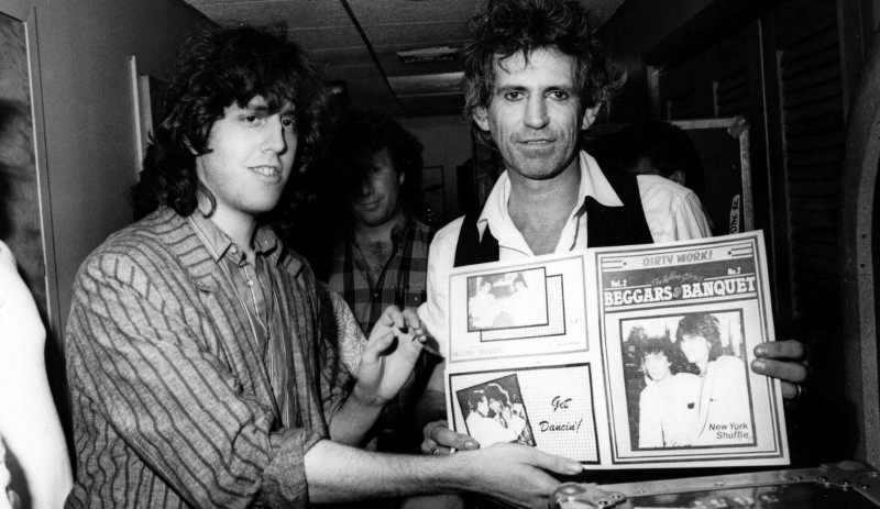 Bill German and Keith Richards with a copy of Beggars Banquet, a fanzine that German began publishing when he was only 16.