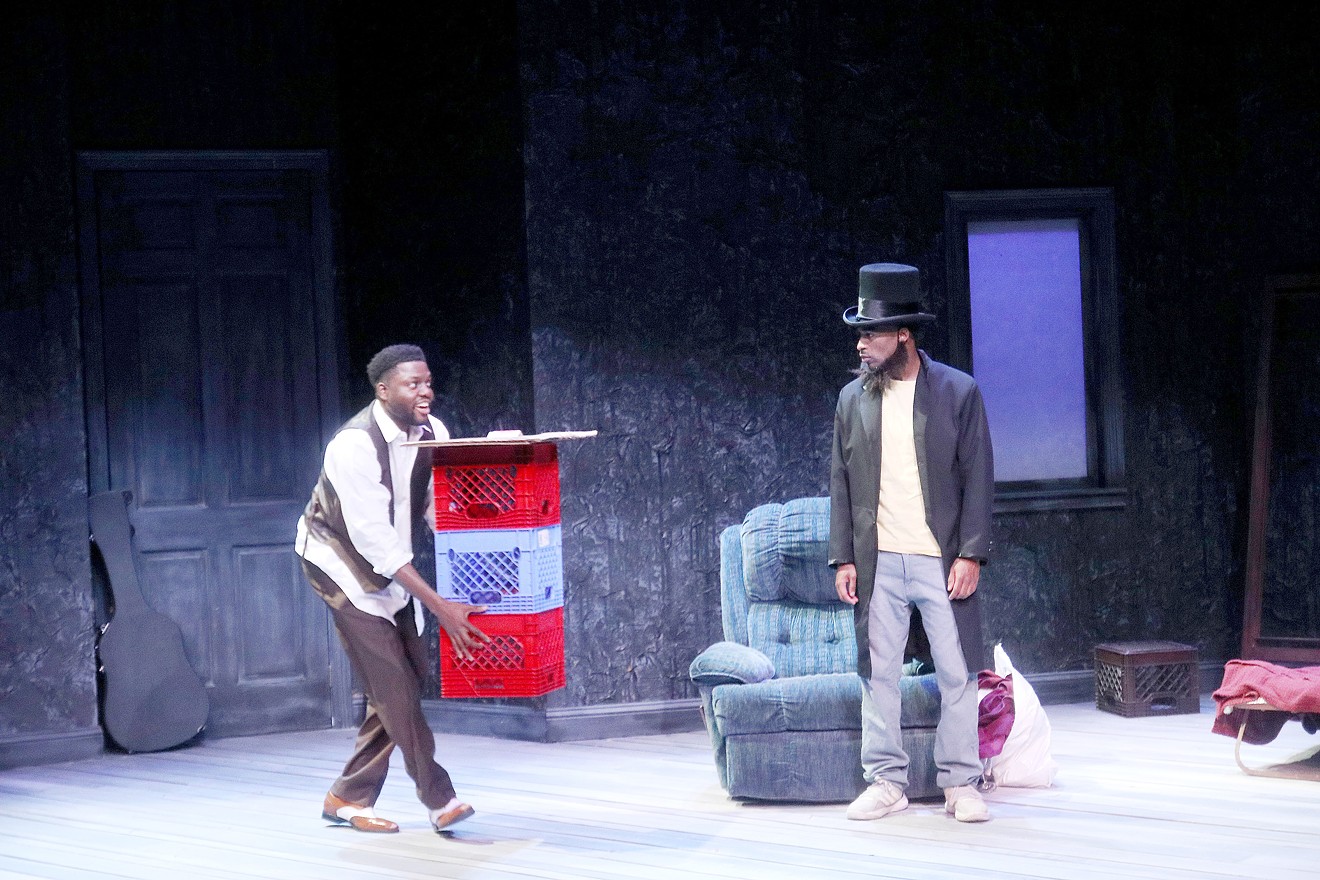 Yao Dogbe and Derrick Moore in the University of Houston Kathrine G. McGovern College of the Arts' production of Topdog/Underdog by Suzan-Lori Parks.