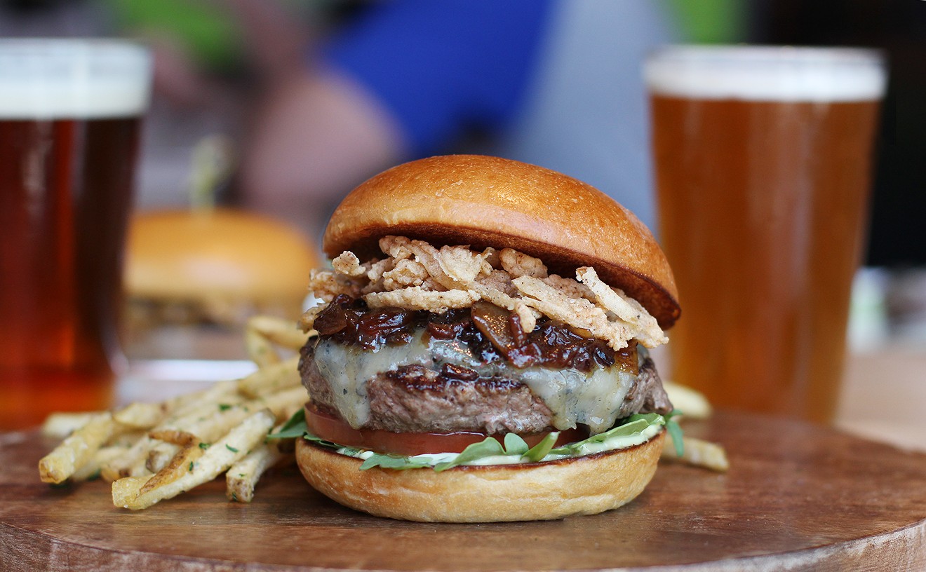 Hopdoddy's special burger features bacon, bourbon and fried "tobacco" onions.