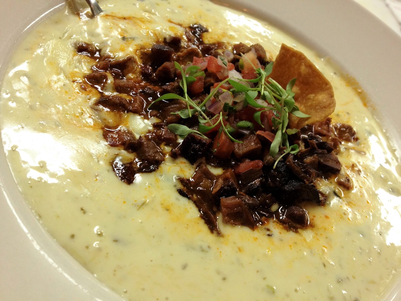 Watch the game in your 'stros gear and get $2 Knocked Up Queso at Beaver's West.