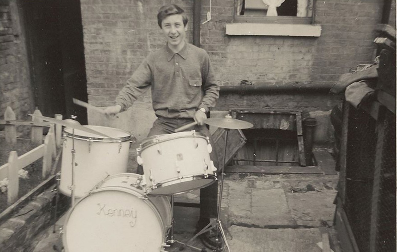 Kenney Jones with his first drum kit. The instrument would lead him to membership in three important classic rock bands.