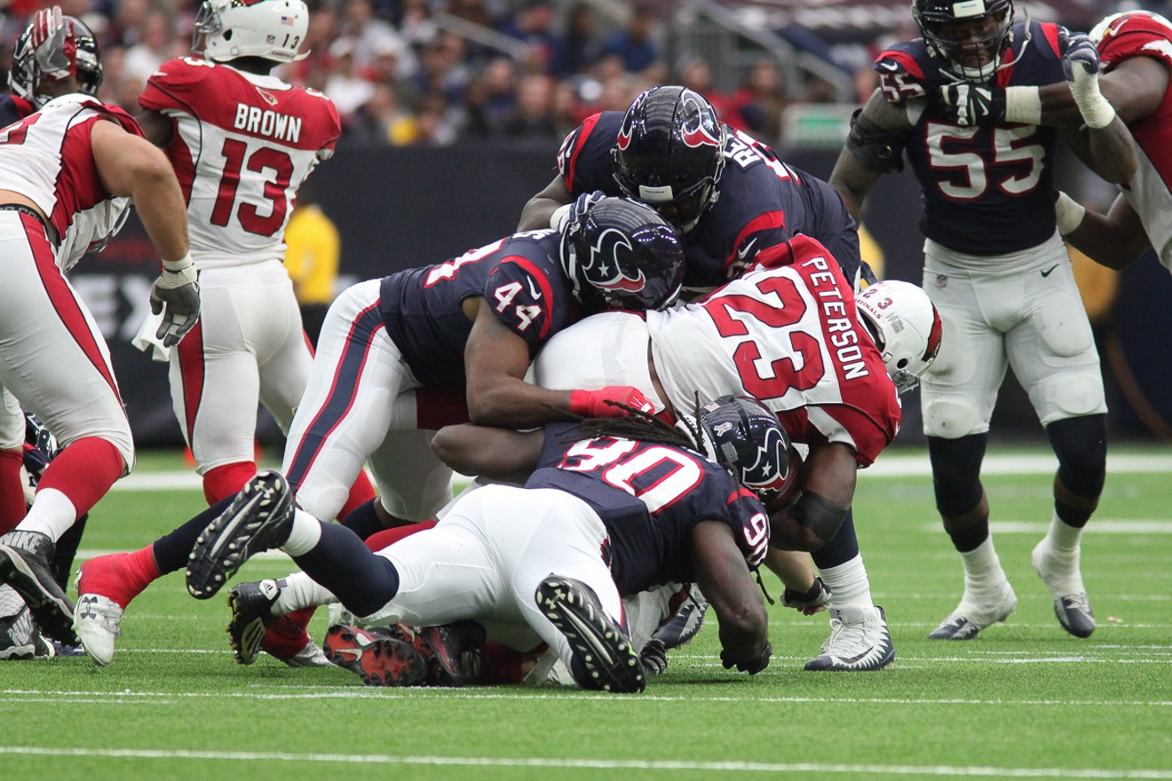Texans defense takes down (23) Adrian Peterson