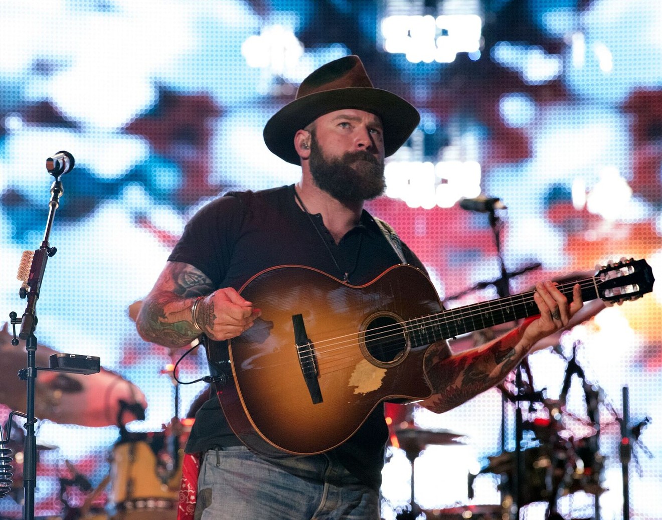 Zac Brown of the Zac Brown Band in front of some pretty lights.